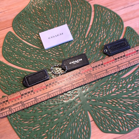 Coach Handbags - Leather purse tabs by Coach…. All for one low price.